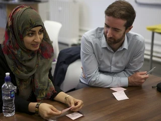 Teach First employees in discussion